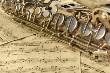 Old saxophone and notes