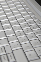 Modern laptop keyboard, closeup