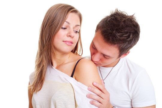 Boy Kissing His Girl In Shoulder