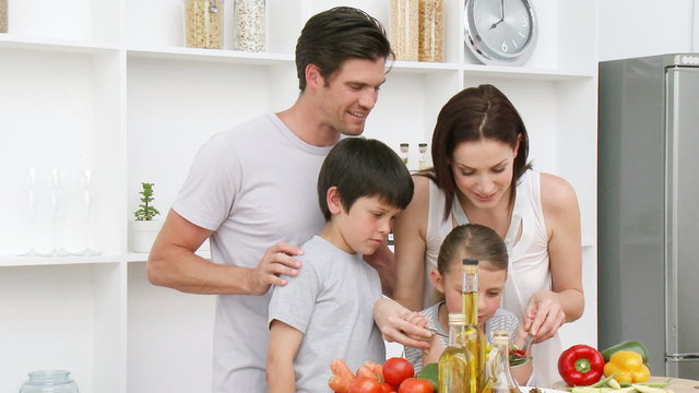 Family at home in Kitchen