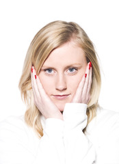 Portrait of a young woman leaning on her hands