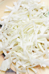 Fresh chopped white cabbage with selective focus