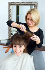 Naklejka premium hair stylist in work