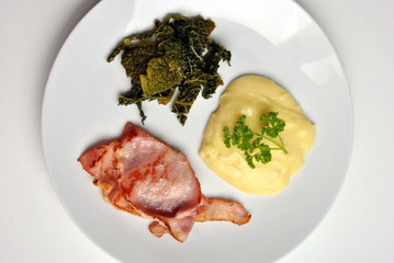savoy cabbage with mashed potato and bacon