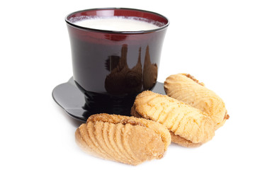 Cup of milk and tasty cookies