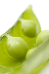 fresh peas on white background