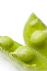 fresh peas on white background
