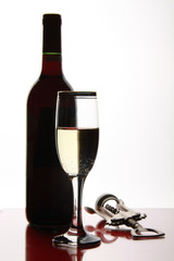 Bottle, goblet and corkscrew