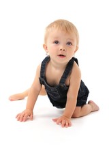 cute little baby girl looking up studio photo on white