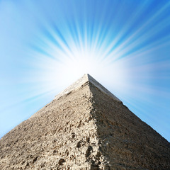Fototapeta premium Egyptian pyramids with sun beams.