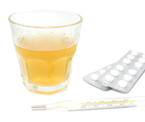 Thermometer, glass and pills