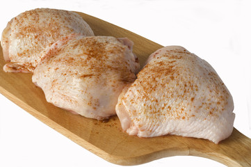 Chicken`s meat on the wood`s board.