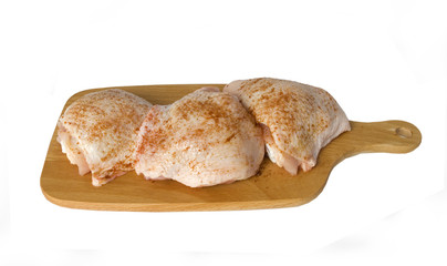 Chicken`s meat on the wood`s board.