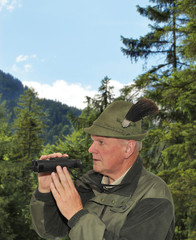 Fototapeta premium Jäger im Wald