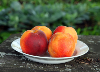 peaches on old wooden table
