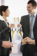 Business people raising toast with champagne © nyul
