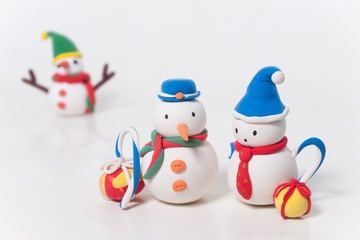 Cute two Snowman dolls made of clay