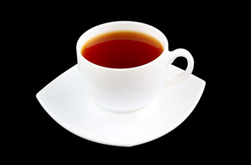 White cup of strong tea on black background