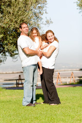 Fototapeta premium Full length family lifestyle portrait