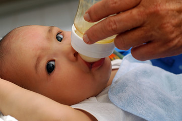 feeding baby milk
