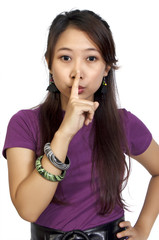 Fototapeta premium Woman With Finger on Lips