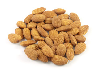Handful of almonds is isolated on white