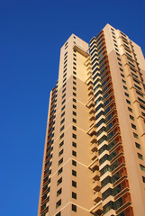 Fototapeta premium modern apartment buildings under blue sky