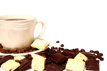 Cup of coffee and chocolate pieces