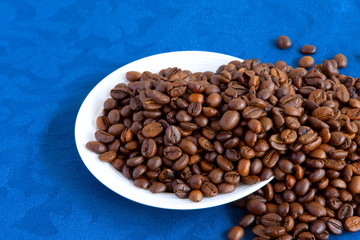 Coffee beans in white plate