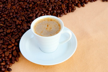 cup with coffee and grain