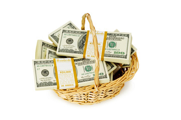 Basket full of dollars isolated on white