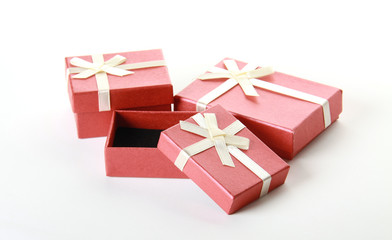 Three terracotta festive boxes over white