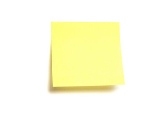 Yellow post-it isolated on white