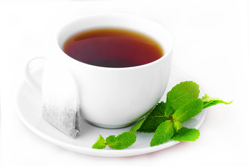 Cup of black tea with mint
