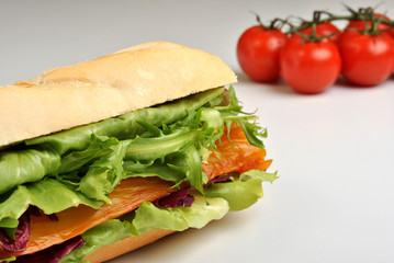 bread roll with organic smoked salmon and tomato