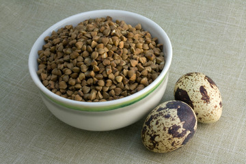 Bowl of Buckwheat and two quail eggs