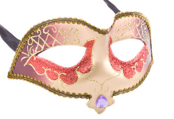 Golden carnival mask on white background