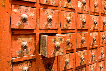 Red drawer of old fashioned chinese cabinet