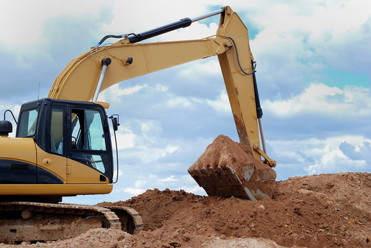 Excavator bulldozer loader in sandpit