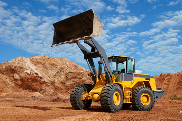 Fototapeta premium wheel loader bulldozer in sandpit