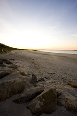 view of a beach before sunset