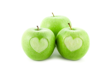 apples with a heart isolated on white