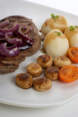 grilled rump steak and potato with organic vegetable