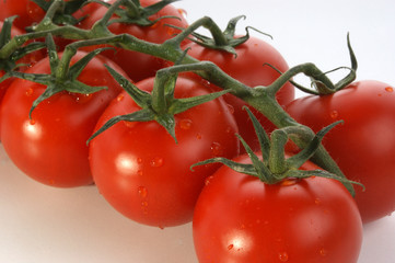 some organic tomato on a white background