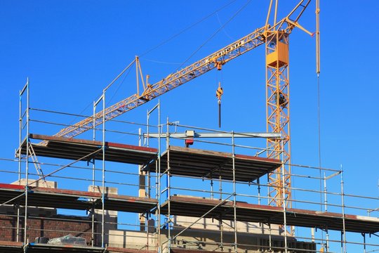 Baukrane, Krane, Hochbau, Hausbau, himmelblau