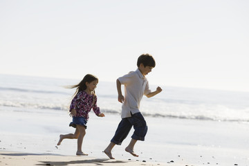 Fototapeta premium Kids Running on Beach