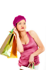 Young sexy shopping woman with lots of bags