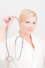 young female doctor with medical stethoscope