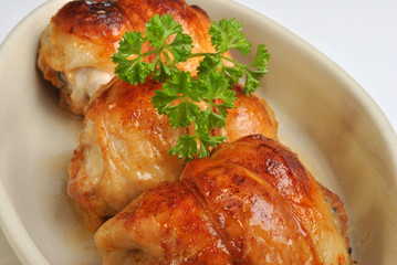 roasted delicious chicken olive in a white bowl
