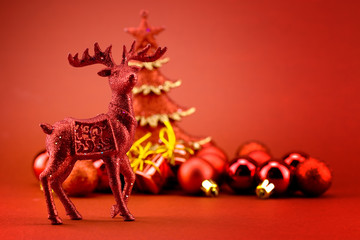 Rudolf near christmas tree
